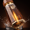 French Avenue Liquid Brun — water droplets close-up