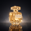 Elie Saab Le Parfum Lumiere — dark luxury shot